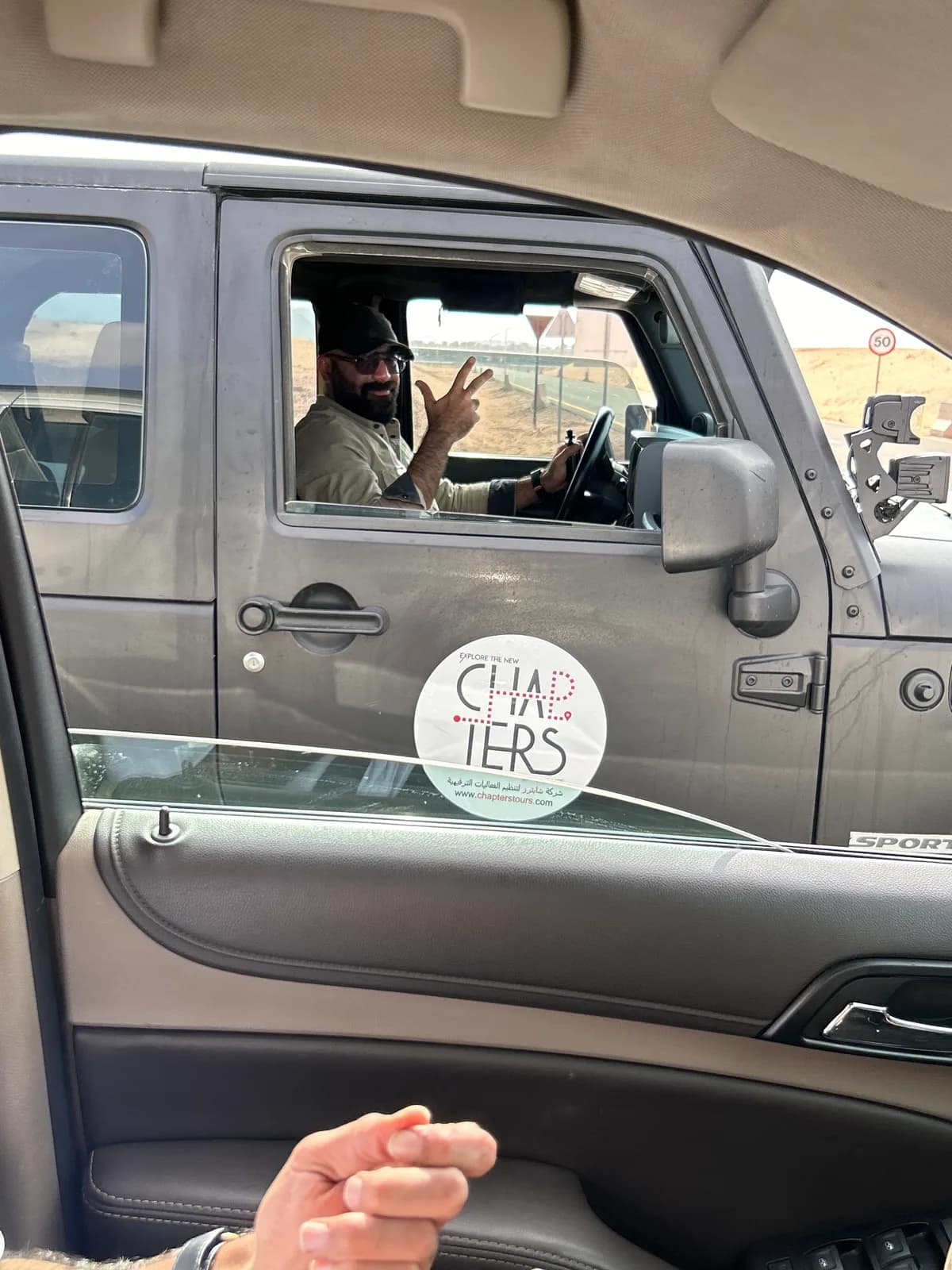 A passing salute between companions of the road